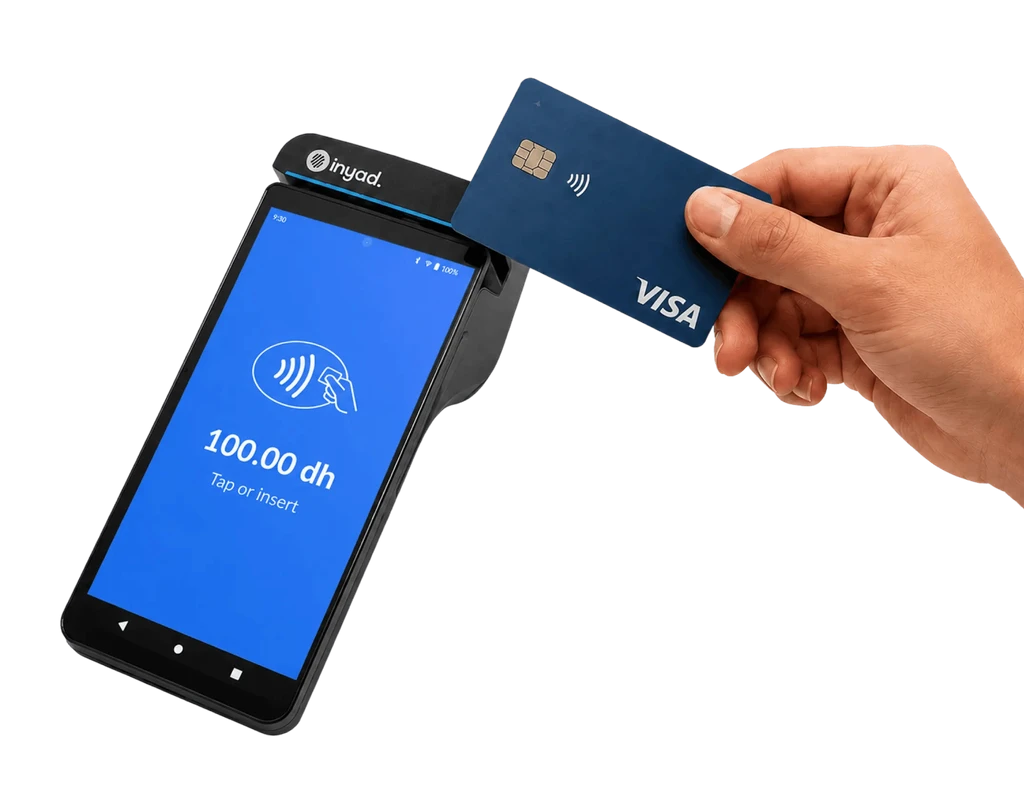 A customer tapping a Visa card on the inyad TPE All-in-One terminal